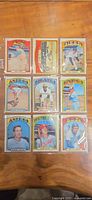 Full view of nine 1972 Topps cards in binder page