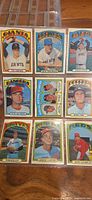 Full view of the nine 1972 Topps cards in sheet