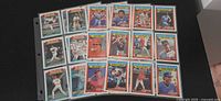 First two binder pages showing 18 1988 Topps Woolworth cards