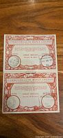 Both Commonwealth reply coupons full view