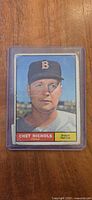 Front view of Chet Nichols 1961 Topps card in holder