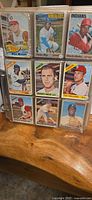Nine-card binder page showing 1969 Topps cards: Bill McCool, Carlos May, Chuck Hinton, Willie Stargell, Twins, multi-player rookies, Giants, Mets, Expos