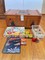 Full lot overview showing chest, games, art supplies, blocks bin