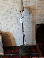 Full view of microphone on stand with cable and base