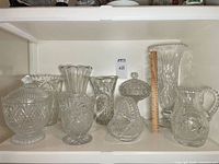 group shot showing all glass pieces on shelf
