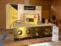 Front view of Dynakit PAS-2 preamp with SWR meter and manuals