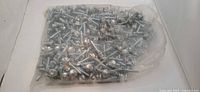 Sealed bag of zinc-plated roofing screws