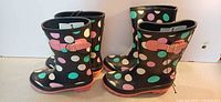 Both pairs of George rain boots, side view