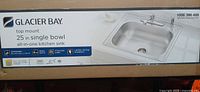 Box front showing Glacier Bay branding and sink image