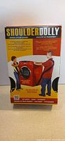 Front of retail box showing ShoulderDolly branding and product image