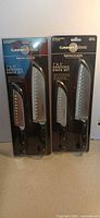 Front view of both sealed Cuisinart Classic Nitrogen Santoku knife sets