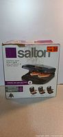 Front of boxed Salton 3-in-1 grill showing product image and name