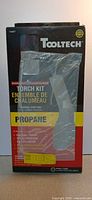 Front view of boxed Tooltech propane torch kit