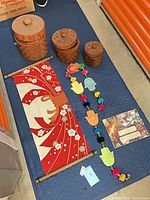 overall view of lot items on blue blanket