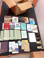 All books laid out showing variety of titles, bindings and condition