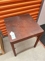 Angled view showing full table shape and legs