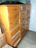 Front view of 21-drawer wooden filing cabinet