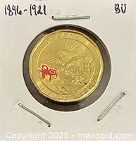 Reverse of 2021 Klondike Gold Rush colour loonie in 2×2 holder