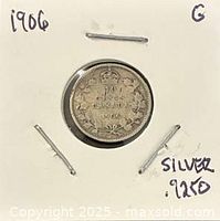 Reverse side showing crowned 10 CENTS CANADA 1906 within wreath in cardboard flip