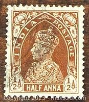Front of 1940 India Half Anna stamp showing design and cancellation