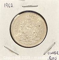 Reverse showing Canadian coat of arms, year 1962 noted