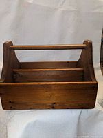 overall view of wooden tool tote front and handle