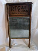 Front view showing Regal Glass branding and glass panel