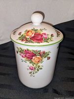 Front view of Royal Albert Old Country Roses jar with lid in place