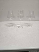 Front view of three Zalto Burgundy glasses