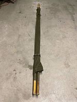 Stretcher folded for storage, full length view