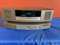 Front view of Bose Wave Radio/CD on multi-disc changer showing display and slots