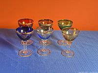 All six coloured glass goblets front view