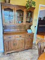 Front view of complete two-piece china cabinet