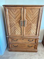 Front view closed showing doors and drawers