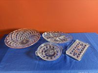 Group shot showing all four glass serving pieces