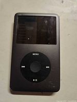 Front view of iPod Classic showing screen and click wheel