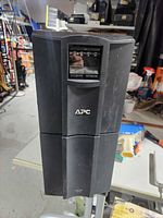 Front view showing APC logo and status panel