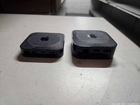Both Apple TV units rear view showing ports