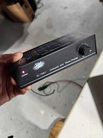 Front view of TCC TC-750LC showing power LED and level knob