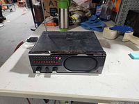 Front and top view of Bearcat 12 scanner showing overall condition and attached antenna