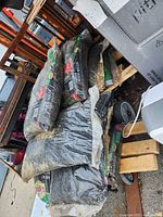 Stack of eight mulch bags on pallet