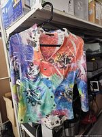 Front view showing multicolor pattern and rhinestone buttons