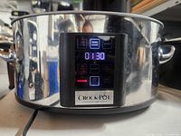 Front view showing stainless body and digital control panel