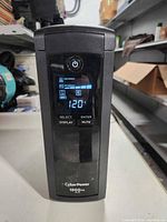 Front view showing LCD status panel and power button