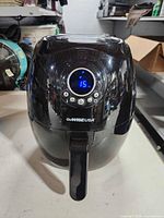 Front view of GoWISE USA air fryer showing digital display at 15 minutes