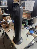 Full view of Holmes tower fan on table
