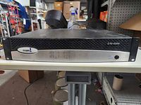 Front view of Crown CTs 4200 amplifier showing overall chassis