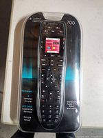 Front view of sealed Logitech Harmony 700 remote package