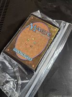 Deck of cards inside clear resealable bag showing card back