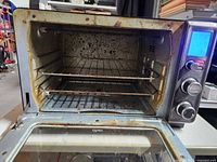 Open door view revealing interior and racks